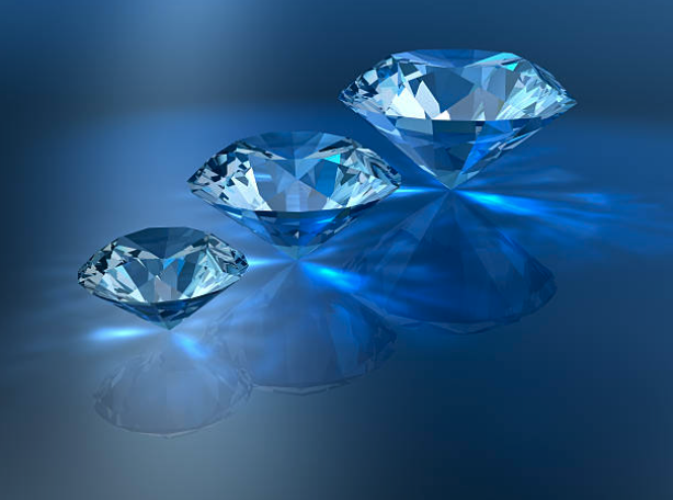 Three brilliant diamonds - three graduated sized diamonds on a blue background
